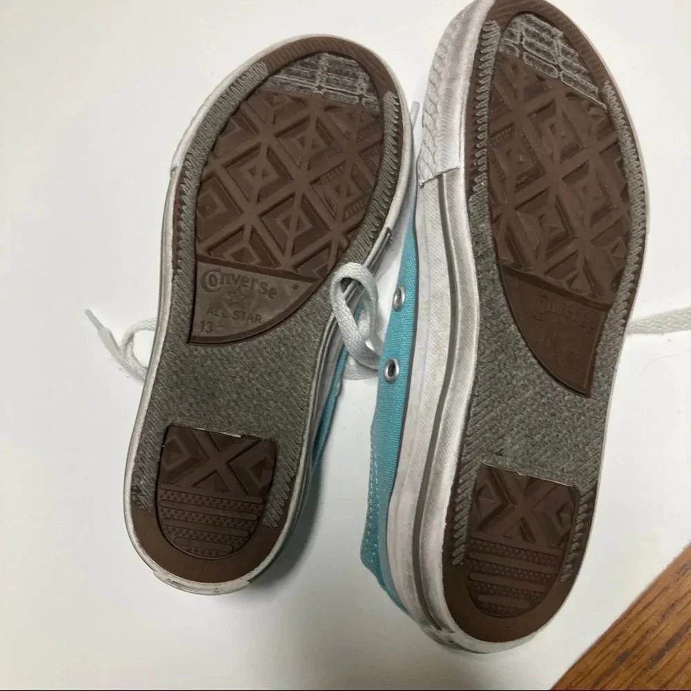 Kids size 13 teal Converse. In play condition